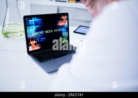 Hacked, laptop or scientist with cyber security attack, virus problem or 404 glitch in laboratory. Screen, password mistake or medical worker with Stock Photo