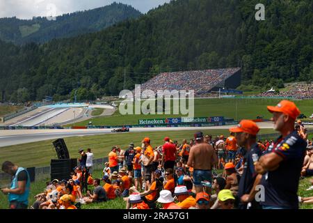 Spielberg, Autriche. 30th June, 2023. Fans watching the race during the 2023 Formula 1 Rolex Grosser Preis von Osterreich, 2023 Austrian Grand Prix, 9th round of the 2023 Formula One World Championship from June 30 to July 2, 2023 on the Red Bull Ring, in Spielberg, Austria - Photo DPPI Credit: DPPI Media/Alamy Live News Stock Photo