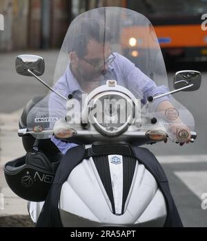 Milan, Italy. 01st July, 2023. Salvini and new highway code: license stop for mobile phone use, drugs and new regulation for the use of scooters and bicycles in the city. Credit: Independent Photo Agency/Alamy Live News Stock Photo