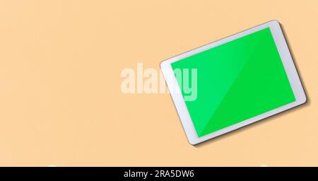 Banner with digital tablet mockup green screen and copy space. Stock Photo