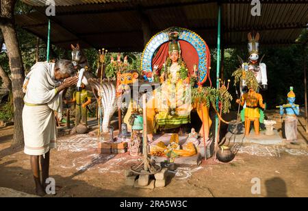 A man worshipping guardian Temple near Thiruvannamalai, Tamil Nadu, South India, India, Asia Stock Photo