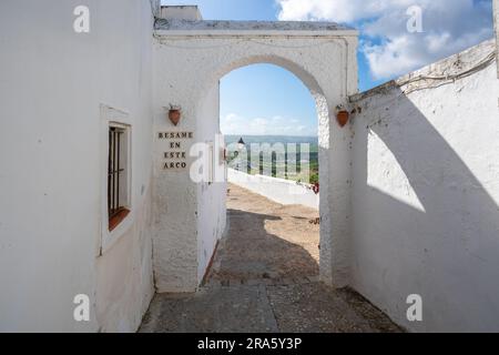 Besame en este arco  (Kiss me in this arc) at Abades Viewpoint - Arcos de la Frontera, Cadiz, Spain Stock Photo