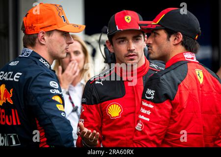 (L-R) Oracle Red Bull Racing's Dutch driver Max Verstappen, Scuderia Ferrari's Monegasque driver Charles Leclerc and Scuderia Ferrari's Spanish driver Carlos Sainz seen after the qualifying session during the Austrian F1 Grand Prix at the Red Bull Ring. Due to the new sprint format Grand Prix weekend, drivers had only one free practice and qualifying session already on Friday afternoon. Red Bull Racing's Dutch driver Max Verstappen took the pole position for Sunday's Grand Prix race, followed by Ferrari's Monegasque driver Charles Leclerc and Spanish driver Carlos Sainz. Stock Photo