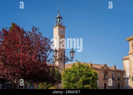 Clock Tower (Torre del Reloj) and Consuegra City Hall at Plaza de Espana Square - Consuegra, Castilla-La Mancha, Spain Stock Photo