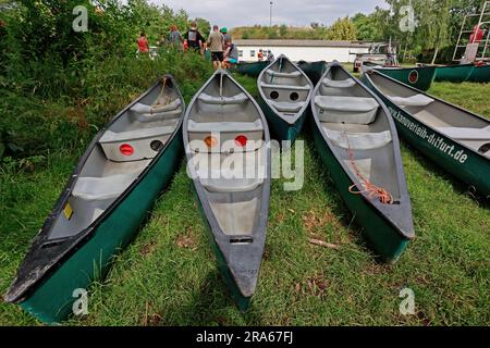 Ditfurt, Germany. 01st July, 2023. Canoe boats are moored at a boat launch. A boat rental offers water recreation on the Bode. Visitors can experience the Bode and the Bode floodplain on a long section from the waterway and get acquainted with the diverse flora and fauna along this river. The tours can last from three to six hours. Credit: Matthias Bein/dpa/ZB/dpa/Alamy Live News Stock Photo