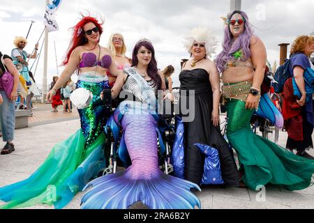 City of Brighton & Hove Seafront, East Sussex, UK. March of The Mermaids marine environmental campaign group teaming up with  Surfers Against Sewage annual parade along Brighton seafront highlighting marine conservation on the south coast of England. 1st July 2023 Credit: David Smith/Alamy Live News Stock Photo