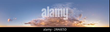 sunset skydome with evening clouds as seamless hdri 360 panorama view in spherical equirectangular format for use in 3d graphics or game development a Stock Photo
