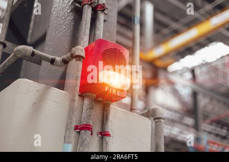 Fire Alarm Fire Detector with quick strobe light alert speaker wall mount for industrial building safety equipment. Stock Photo