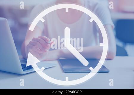 Business working hours Office shift times Day working loop cycle concept, Closeup people with laptop and tablet overlay minimal time clock. Stock Photo