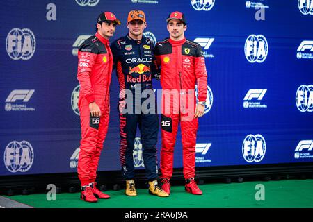 Spielberg, Austria. 30th June, 2023. (L-R) Scuderia Ferrari's Spanish driver Carlos Sainz, Oracle Red Bull Racing's Dutch driver Max Verstappen and Scuderia Ferrari's Monegasque driver Charles Leclerc pose for photos after the qualifying session of the Austrian F1 Grand Prix at the Red Bull Ring. Credit: SOPA Images Limited/Alamy Live News Stock Photo