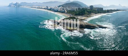 Aerial view of Rio de Janeiro, Ipanema beach and Pedra do Arpoador. Skyscrapers beaches and nature, surfers in the water. 06-07-2023. Brazil Stock Photo