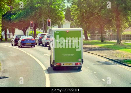 waitrose home delivery van on the road Stock Photo