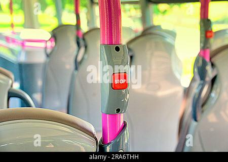 empty first bus seats red press switch Stock Photo