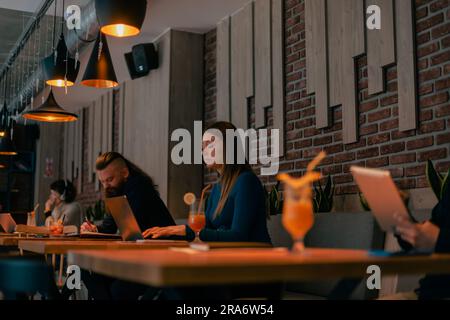 An attractive businesswoman working remotely on the lap top Stock Photo