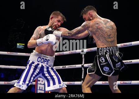 Adam Cope (left) and Lewis Sylvester in action during their English ...