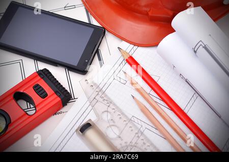 blueprint, phone and tools on the desktop, workspace engineer Stock Photo