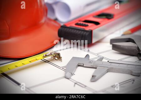 workspace engineer, blueprint apartment  and tools on desktop Stock Photo