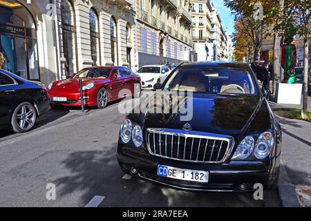 Paris, France - October 26th 2019 : Black Maybach 57s parked on George V avenue. You can also see a red Porsche Panamera and a white Maserati Ghibli. Stock Photo