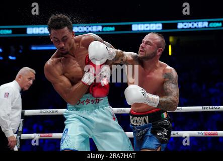 Ben Whittaker (left) and in action against Vladimir Belujsky during their Light-heavyweight bout at the AO Arena, Manchester. Picture date: Saturday July 1, 2023. Stock Photo