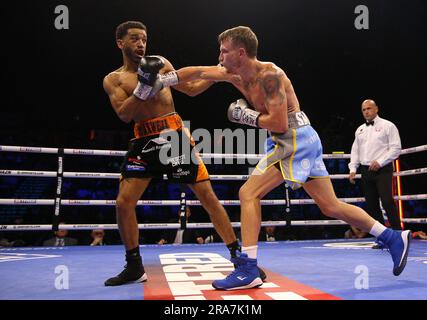Sam Maxwell (left) and Dalton Smith in action during their British and Commonwealth Super-Lightweight Titles bout at the Utilita Arena Sheffield. Picture date: Saturday July 1, 2023. Stock Photo