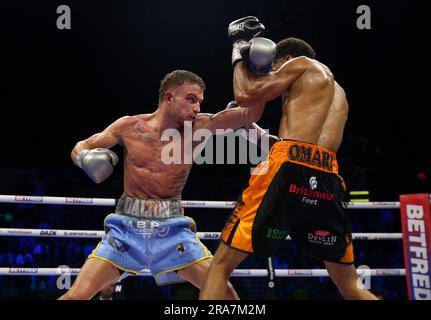 Dalton Smith (left) and Sam Maxwell in action during their British and Commonwealth Super-Lightweight Titles bout at the Utilita Arena Sheffield. Picture date: Saturday July 1, 2023. Stock Photo