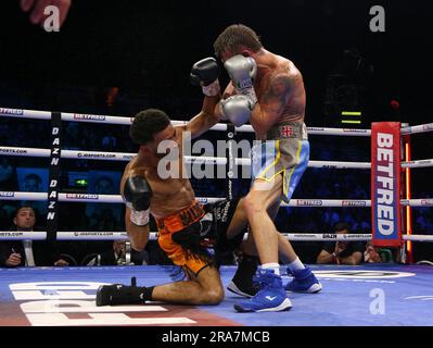 Sam Maxwell (left) is knocked out by Dalton Smith during their British and Commonwealth Super-Lightweight Titles bout at the Utilita Arena Sheffield. Picture date: Saturday July 1, 2023. Stock Photo