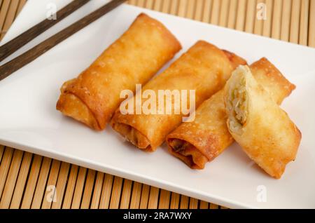 Spring rolls, a flavorful and crispy Asian appetizer filled with fresh vegetables and often served with a dipping sauce Stock Photo