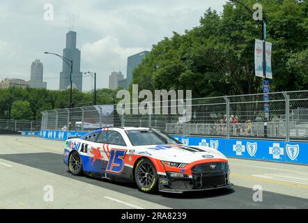 Chicago, United States. 01st July, 2023. The iconic Willis Tower (Sears Tower) rises over the course as NASCAR Cup Series driver Jenson Button (15) during Grant Park 220 NASCAR Cup Series practice in Chicago on Saturday, July 1, 2023. Photo by Mark Black/UPI Credit: UPI/Alamy Live News Stock Photo