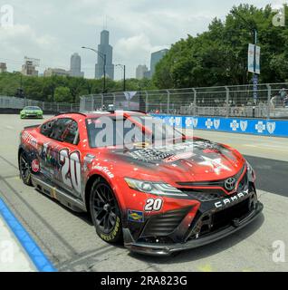 Chicago, United States. 01st July, 2023. The iconic Willis Tower (Sears Tower) rises over the horizon as NASCAR Cup Series driver Christopher Bell (20) during Grant Park 220 NASCAR Cup Series practice in Chicago on Saturday, July 1, 2023. Photo by Mark Black/UPI Credit: UPI/Alamy Live News Stock Photo