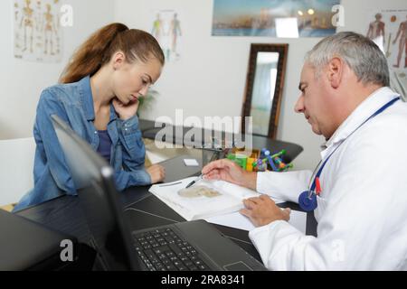 a young woman in consultation Stock Photo