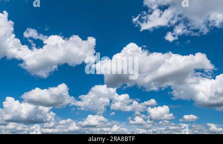 Bright sky with many cumulus clouds Stock Photo