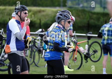 Melrose, UK. 02nd July, 2023. Cyclists from across the country arrive at Melrose, to take part in the Doddie Ride 2023, There are three DoddieÕ5 Ride distance options C the 93 mile DoddieÕ5 Big Yin, the 60 mile DoddieÕ5 Classic and the 22 mile DoddieÕ5 Challenge. All three distances start and finish at Melrose RFC. DoddieÕ5 Big Yin follows the Classic route until Kelso where it branches off on a 33 mile loop via Coldstream before rejoining the Classic towards a well earned lunch at Jedforest RFC. Credit: Rob Gray/Alamy Live News Stock Photo