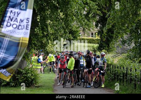 Melrose, UK. 02nd July, 2023. Cyclists from across the country arrive at Melrose, to take part in the Doddie Ride 2023, There are three DoddieÕ5 Ride distance options C the 93 mile DoddieÕ5 Big Yin, the 60 mile DoddieÕ5 Classic and the 22 mile DoddieÕ5 Challenge. All three distances start and finish at Melrose RFC. DoddieÕ5 Big Yin follows the Classic route until Kelso where it branches off on a 33 mile loop via Coldstream before rejoining the Classic towards a well earned lunch at Jedforest RFC. Credit: Rob Gray/Alamy Live News Stock Photo