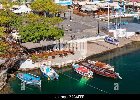 Fishing boats on Lake Voulismeni at the harbour promenade, Agios Nikolaos, Crete, Greece, Agios Nikolaos, Crete, Greece Stock Photo