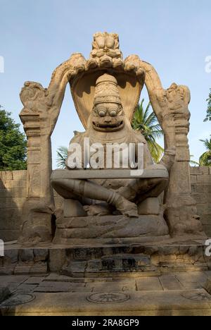 The 6. 7 meters tall Lakshmi-Narasimha Ugranarasimha, was executed in 1528 A. D. during the rule of Krishnadevaraya in Hampi, Karnataka, South India Stock Photo