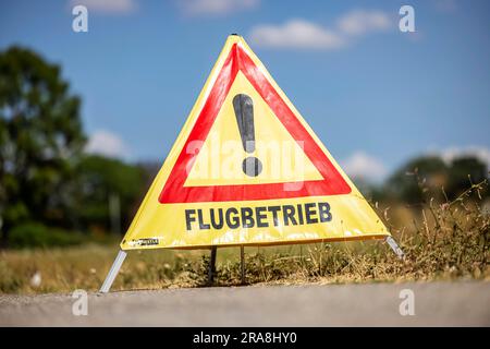 Traffic sign Achtung Flugbetrieb, Baden-Wuerttemberg, Germany Stock Photo