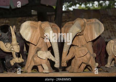 Carved elephants, Akamaba craft market, Mombasa, Kenya, carvers, carving Stock Photo