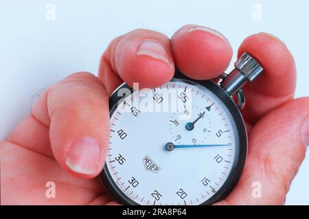 Stop watch in hand Stock Photo