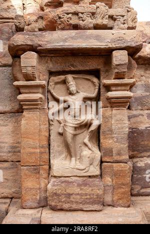 8th century Gajasamharamurthi, lord Shiva killing demon disguise elephant, sculpture on the external wall of Mallikarjuna temple in Pattadakal Stock Photo