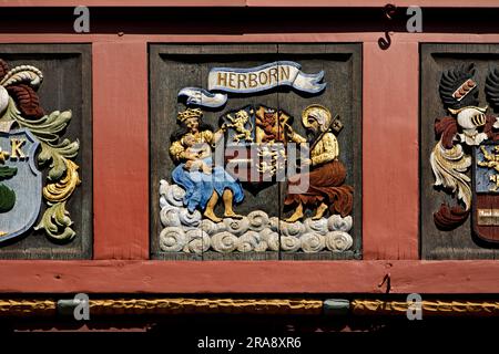 Detail of the surrounding coat of arms frieze on the town hall, historic old town, Deutsche Fachwerkstrasse, Herborn, Hesse, Germany Stock Photo