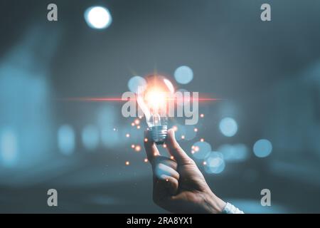 woman Hand holding Light bulb Global Internet connection. Business global internet connection application technology and digital marketing, Financial Stock Photo