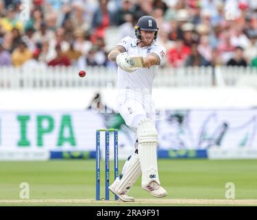 Ben Stokes of England hits the ball for two runs during the LV= Insurance Ashes Test Series Second Test Day 5 England v Australia at Lords, London, United Kingdom, 2nd July 2023  (Photo by Mark Cosgrove/News Images) Stock Photo