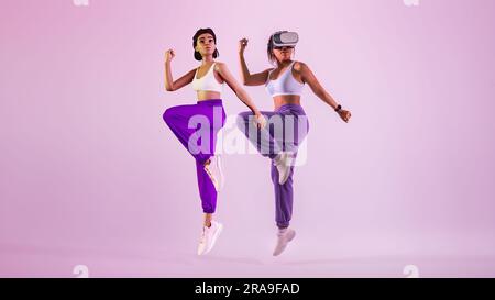 Young african american woman wearing vr headset playing dancing game in metaverse as 3D avatar, panorama, free space Stock Photo