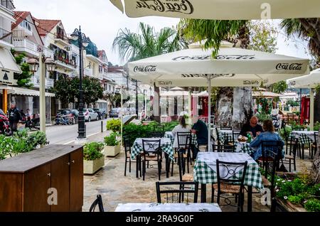 Zakynthos, Zakynthos, Greece May 22 2023 - Diners eating lunch outside in Zakynthos restaurant Greece Stock Photo
