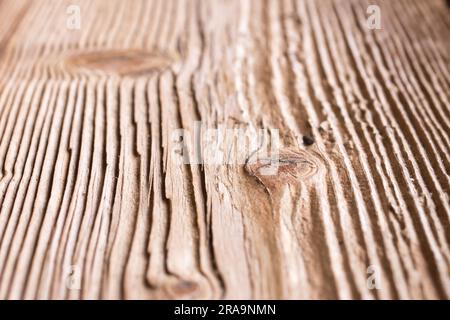 Vintage brushed old board of hard wood, detail of knots Stock Photo