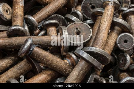 wooden spools for use on a hirstoric loom Stock Photo