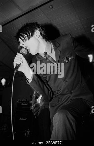 MENSWEAR, FIRST UK TOUR, 1995: Johnny Dean of the Britpop band Menswear playing live at Glamorgan University in Wales, UK on 4 May 1995. Photo: Rob Watkins.  INFO: Menswear is a British indie rock band that emerged during the 1990s Britpop era. Known for their stylish image and energetic sound, they gained attention with hits like 'Daydreamer' and 'Stardust,' blending jangly guitars with catchy, pop-infused melodies. Stock Photo