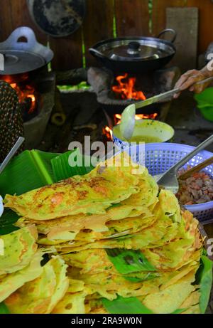 Traditional pancakes (Banh Xeo) at local restaurant in My Tho, Tien Giang Province. Stock Photo