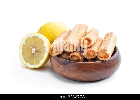 Homemade  lemon jam filled sticks in wooden bowl isolated on white Stock Photo