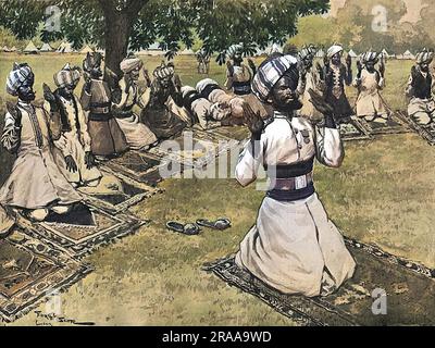 Indian officers, in London to take part in the Coronation procession of King Edward VII, spontaneously go to pray in the field opposite Fulham Palace, when they receive the news that the king has been taken ill with appendicitis just two days before his Coronation.  He thankfully recovered and his Coronation took place six weeks later.     Date: 1902 Stock Photo